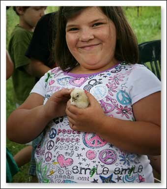 Girl with Chick at 55th Annual Farm City Days at the Historic Blair Farm